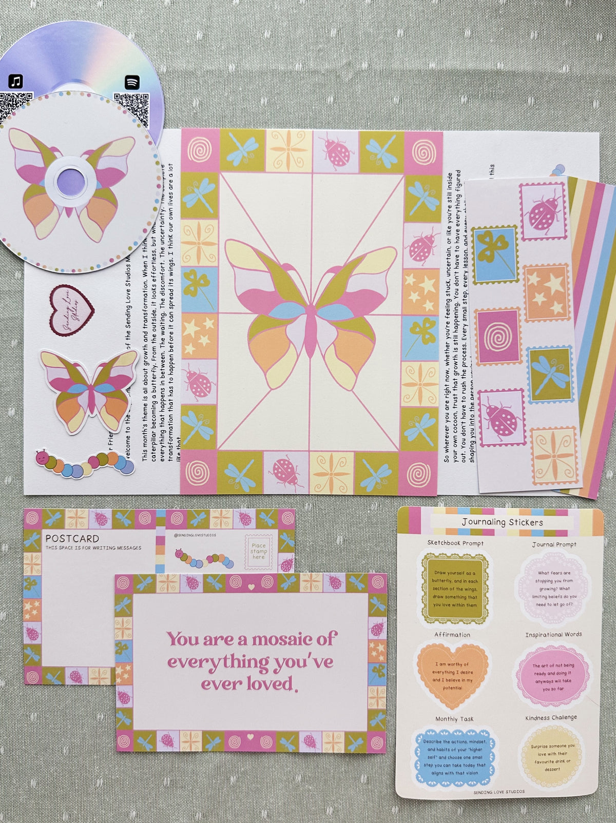 All of the items of the mail club edition printed out and laid flat out on the table