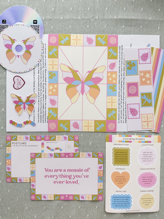 All of the items of the mail club edition printed out and laid flat out on the table